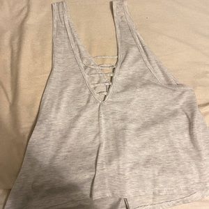 Light grey tank top. Size: Medium